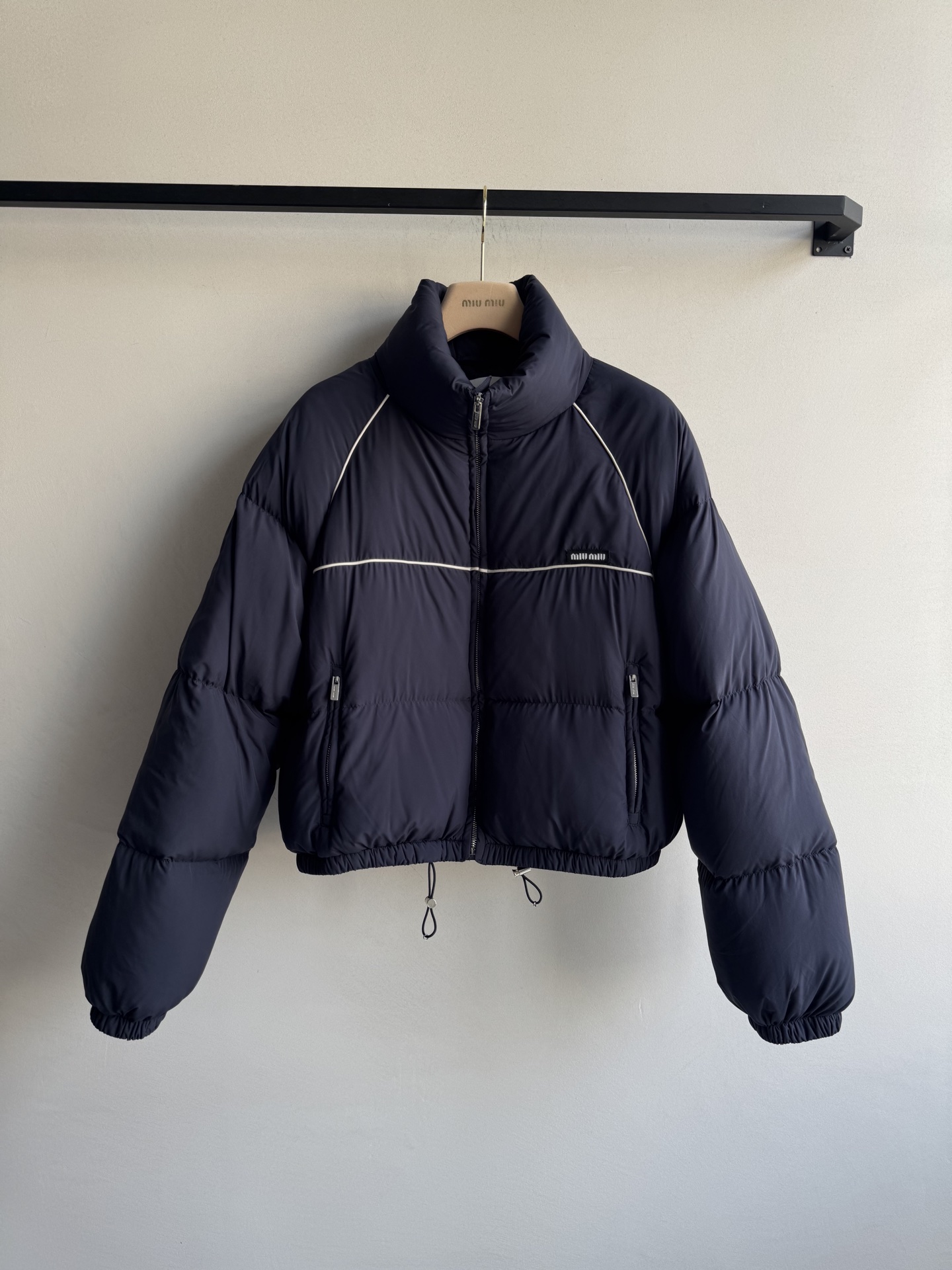 Bagsaaa Miu Miu down jacket with high collar and a cropped length navy blue